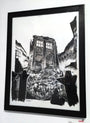 Tim Doyles original pen and ink illustration, framed on a white wall, depicts a TARDIS in a desolate landscape partially buried under rubble. Black gravestone silhouettes stand solemnly in the foreground, evoking The Fields of Trenzalores mysterious aura.