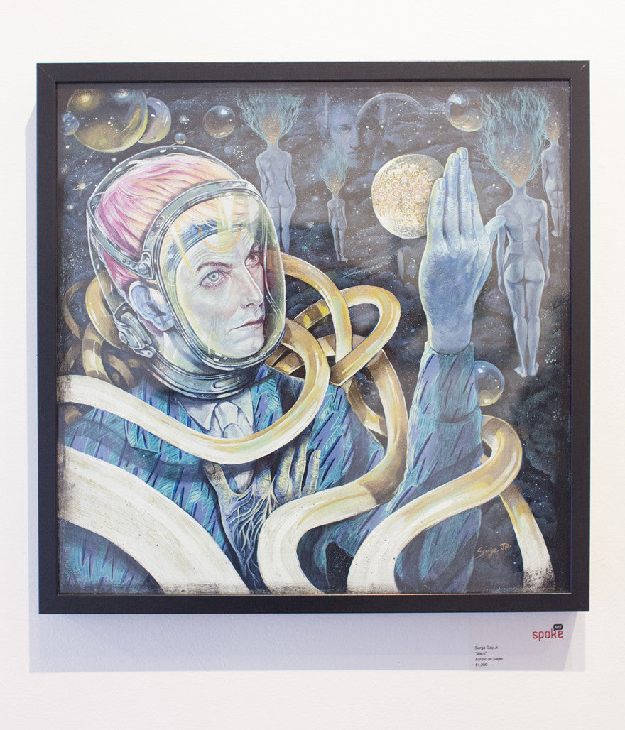 A framed artwork by Serge Gay Jr. features a futuristic figure in a spacesuit amid floating gold ribbons, surrounded by ethereal figures and celestial objects reminiscent of David Bowies Life on Mars, as the figure holds a glowing orb, gazing thoughtfully into the distance.