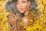 A vibrant Serge Gay Jr. artwork features a woman with long, wavy hair and large hoop earrings, surrounded by vivid yellow doodles with words like shhh... and Love, alongside stars, a skull, and a stylized dog.