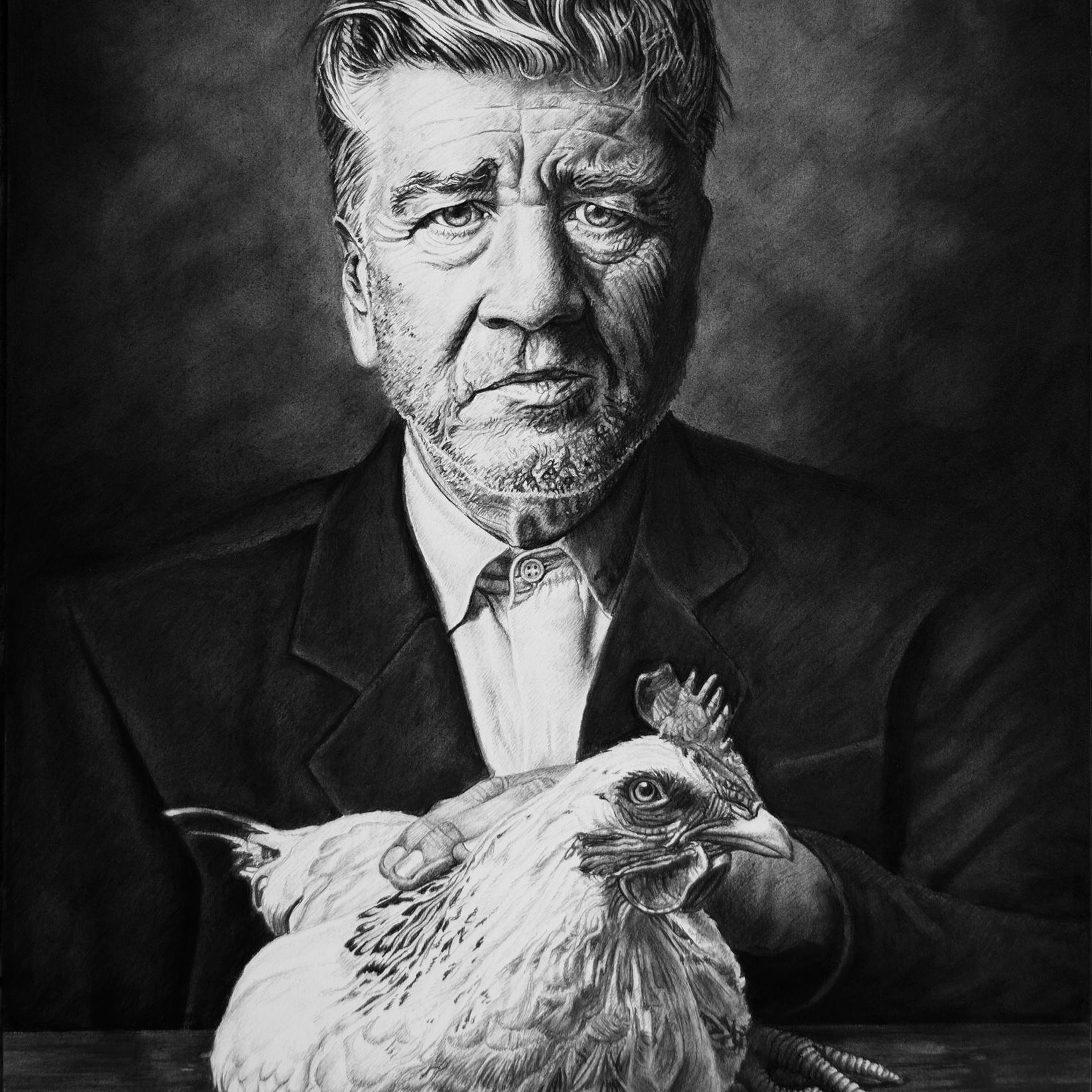 A black and white drawing by Joel Phillips shows an older man with wavy hair and a serious expression in a suit. He delicately holds Davids Lunch—a chicken—on a table, against a dark, textured background, crafted with charcoal and graphite.