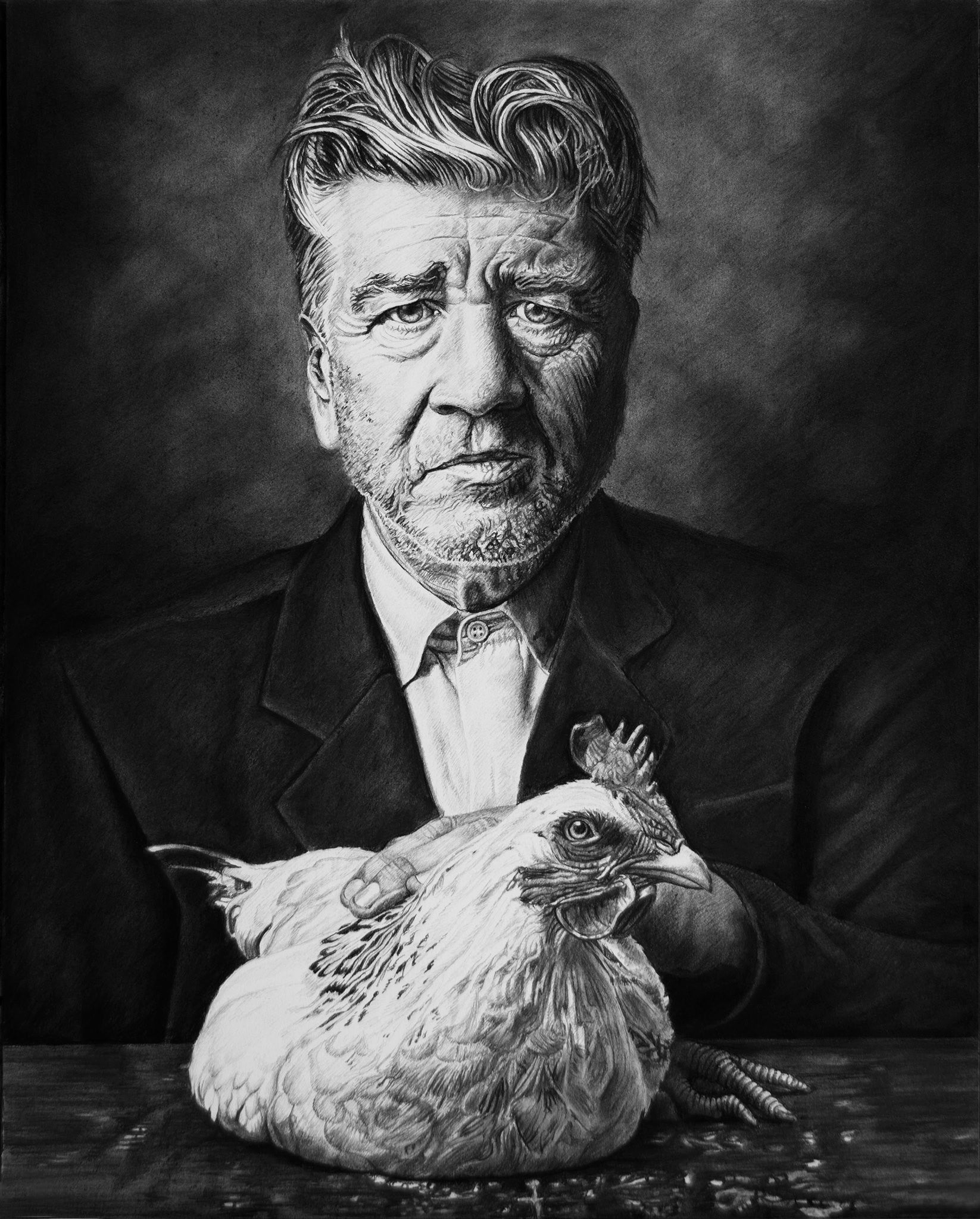 A black and white drawing by Joel Phillips shows an older man with wavy hair and a serious expression in a suit. He delicately holds Davids Lunch—a chicken—on a table, against a dark, textured background, crafted with charcoal and graphite.
