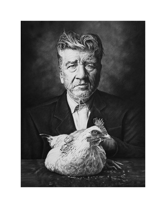 A Joel Phillips fine art giclee print presents a black and white portrait of an older man with textured hair, in a dark suit and light shirt. Seated at a table, he holds a chicken named Davids Lunch, gazing directly at the viewer.