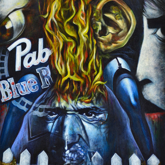 The surreal artwork features vivid colors with a burning head, intense flames, and a tearful face behind a white fence created in acrylic on panel. The text Pab Blue R on the left heightens the chaos as Frank Emerges from the Joemur brand’s tumultuous scene.
