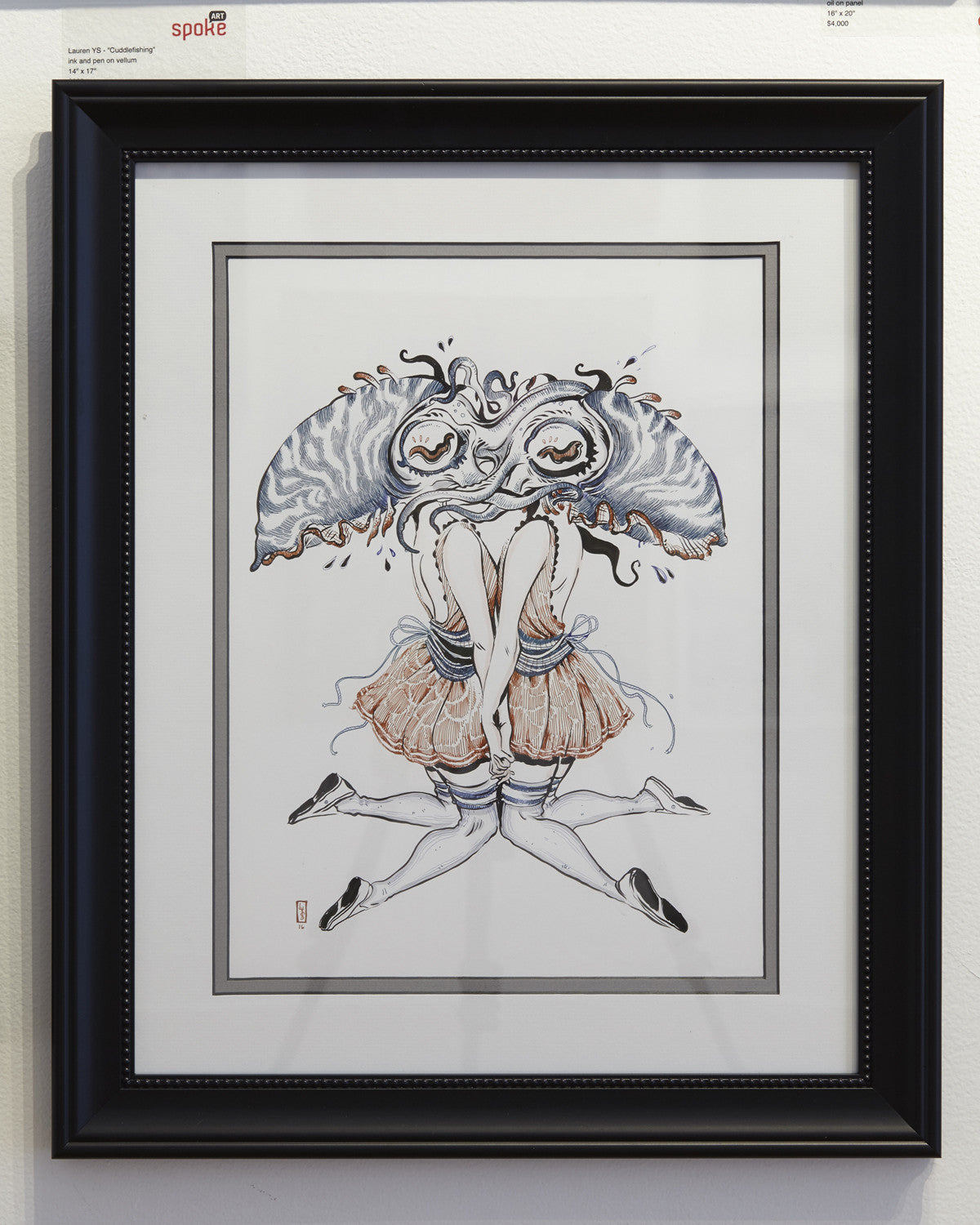 Lauren YSs framed artwork portrays a surreal figure with dual female forms conjoined at the back in short dresses and high socks. Their heads are adorned with large, abstract wing- or shell-like elements with eyes, embodying Suggestivism: Resonance.