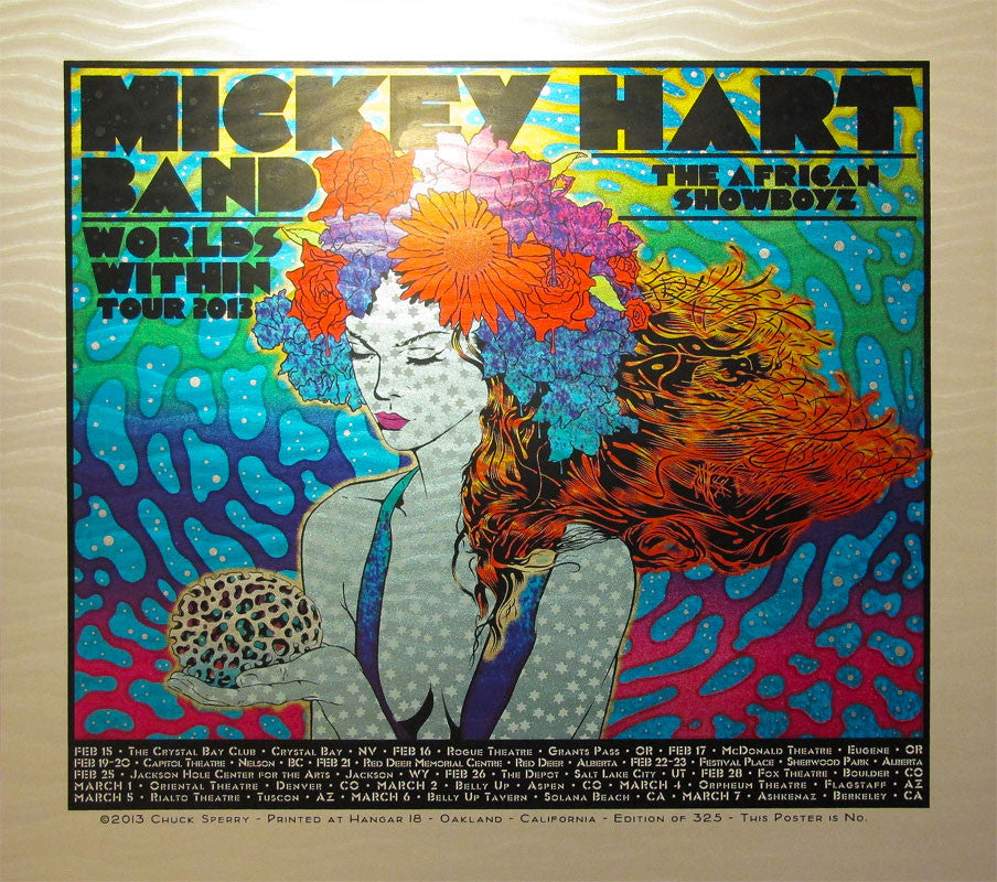 Chuck Sperrys psychedelic tour poster features a woman with flowing hair, vibrant flowers, and a skull. It highlights Mickey Hart Band, The African Showboyz, and Worlds Within Tour 2013 dates and locations on a colorful background.