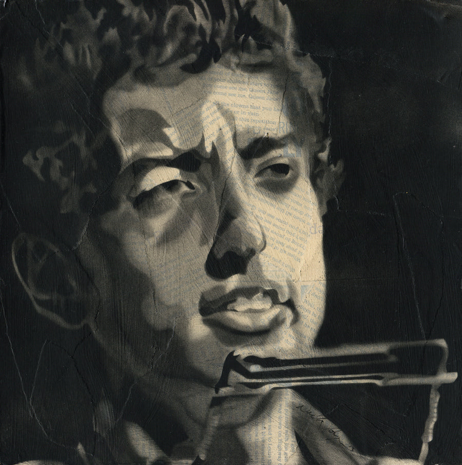 A monochrome portrait of a man with a contemplative expression, singing into a microphone, showcased at Spoke Art gallery. Created by Nick Comparone, its set against a textured background with faint Desolation Row-inspired text overlays; the lower part of his face is partially shadowed.