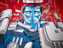 Tim Doyles screen print showcases a stylized individual in a dynamic blue and red color scheme, surrounded by mechanical elements. Set against a vivid red backdrop, this captivating artwork exudes an otherworldly futuristic vibe.