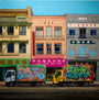 A colorful urban scene, in Jessica Hesss style, features two graffiti-covered trucks parked by vibrant Chinese-signaged buildings. This oil-on-panel piece captures detailed architecture and a clear sky, enhancing the lively Chinatown delivery atmosphere.