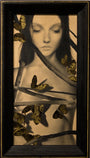 This framed artwork by Alessandra Maria displays a peaceful woman with closed eyes, encircled by delicate branches and yellow butterflies featuring intricate black patterns. The monochrome backgrounds thin lines contrast beautifully with the vibrant butterflies.
