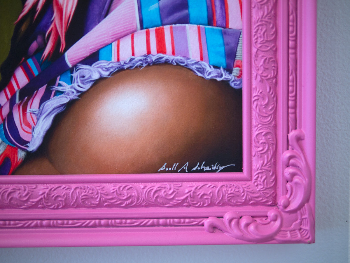 Close-up of a vibrant Scott Scheidly painting features colorful striped fabric and realistic skin detail. An ornate pink frame offers contrast, enhancing the rich colors. This artwork is available as an archival pigment limited edition print, with the artists signature visible in the corner.