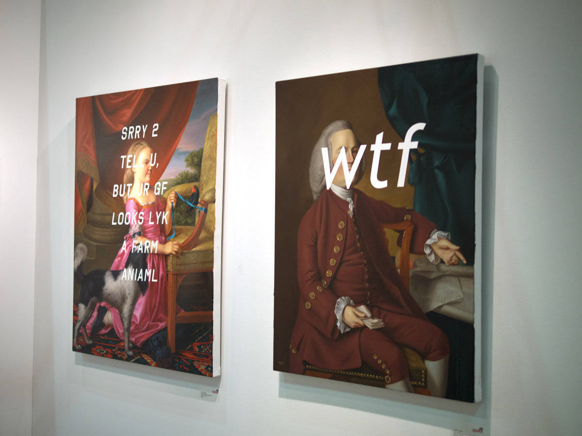 Two framed artworks hang on a wall. The left features acrylic text, SRRY 2 TELL U, BUT UR GF LOOKS LYK A FARM ANIMAL, over a classical scene. The right, by Shawn Huckins, resembles his style with a classic portrait and bold wtf across it.
