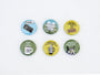 Arthurs Plaid Pants offers a Twin Peaks-themed set with six buttons and a magnet, featuring iconic designs: Diane... with a tape recorder, Welcome to Twin Peaks, Do Not Introduce the Log, Damn Fine Coffee and Hot, Theres a Fish in the Percolator, and The Owls Are Not What They Seem.