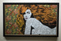 A framed screen print by Chuck Sperry depicts a woman with flowing orange hair set against a floral backdrop. Her body features intricate white designs, and her gaze, reminiscent of Olympia, contrasts strikingly with the vibrant background.