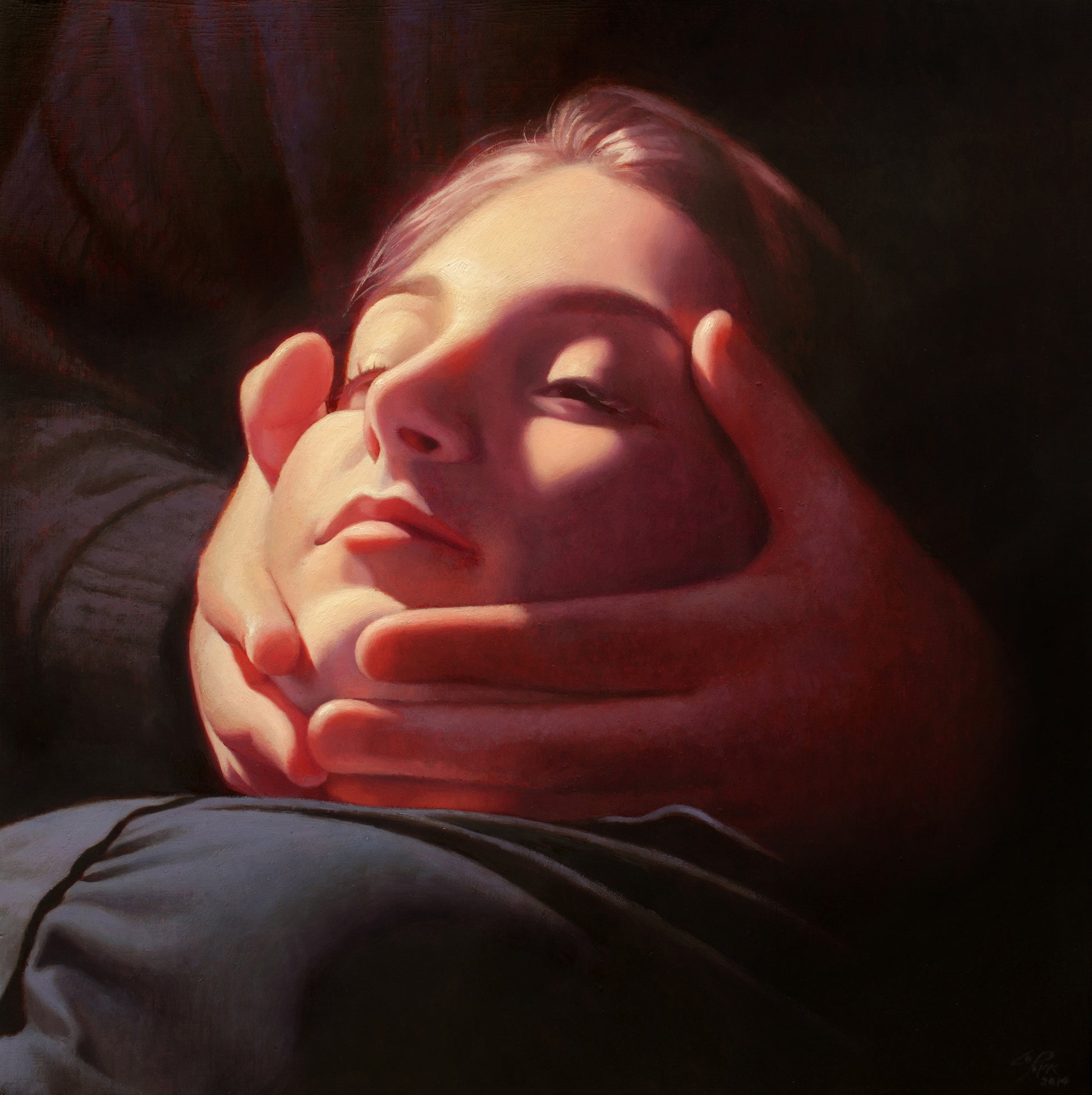 A persons serene face, softly illuminated like a Peter Chan oil painting, is gently cradled by hands against a dark background, highlighting the peaceful expression and tender gesture.