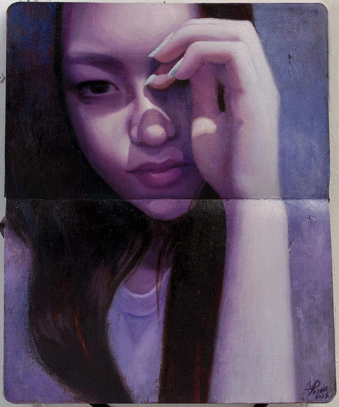 Peter Chans close-up painting shows a long-haired person with a hand on their forehead. This oil on Moleskine technique casts dramatic shadows in a purple hue, evoking introspection and clarity through its expressive artistry in an open sketchbook.