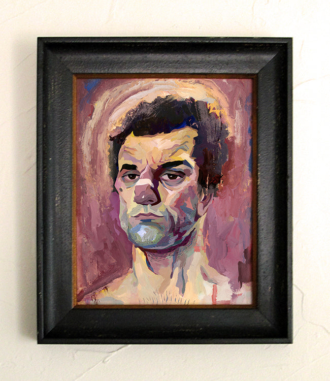 Rich Pellegrinos captivating Scorsese art tribute features a framed portrait of a person with short dark hair in a painterly style. The background merges purples and warm tones, creating a halo effect around the head. This black-framed piece hangs elegantly on a textured white wall.