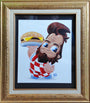 A framed painting by Ryan Hungerford features a playful cartoon character reminiscent of Big Bobs BeefSquatch from Bobs Burgers at Spoke Art NYC, with a beard, styled hair, red and white checkered outfit, holding a cheesy burger and displaying big eyes with an infectious expression.