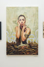 A Soey Milk painting of a contemplative woman amidst abstract shapes, her face resting on her hands. Crafted with oil and silver leaf on canvas, it showcases a textured background of muted green and earthy tones. Displayed at Spoke Art Gallery.