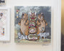 Steve Seeleys painting features three bears and two wolves around a totem pole with various stylized animal faces, set in a Yokai-inspired forest, with a small color palette in the upper left.
