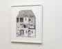 Jonas Lofgrens framed graphite illustration depicts a miniature house with a tiled roof, sectioned to reveal detailed interiors like a kitchen and living area against a light-colored wall.