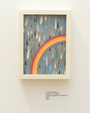 A framed artwork by Timothy Karpinski, titled Head in The Clouds, features a rainbow with stylized raindrops on a cloudy background and is on display at Spoke Art Gallery. It uses acrylic and graphite on hand-cut paper and is priced at $250.