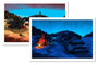 Part of Tim Doyles UnReal Estate series, this limited edition print showcases two captivating scenes: an individual standing on a crashed spaceship at sunset above, and below, the ship illuminated by a glowing campfire at night.