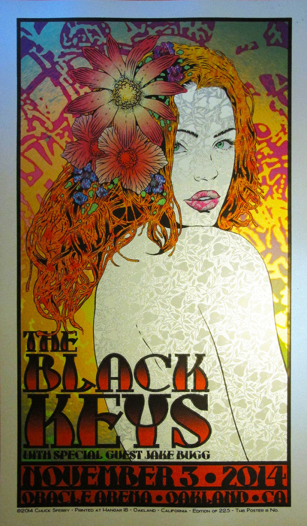 This Chuck Sperry artwork vividly captures The Black Keys concert with vibrant psychedelic hues on blue opal metallic paper, featuring a womans face entwined in floral and leaf designs. Text includes: The Black Keys with Jake Bugg, Nov 3, 2014, Oracle Arena, Oakland, CA.