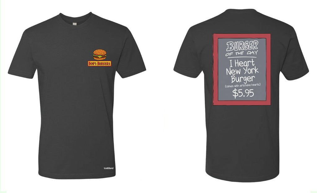 Toddlands official dark gray T-shirt features a Bobs Burgers logo with a burger on the front, while the back displays a chalkboard-style BURGER OF THE DAY: I Heart New York Burger, $5.95 design, including an I Love NY hat.