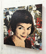 A Greg Gossel canvas painting features a woman with short dark hair and a playful smile, set against an acrylic collage of abstract and vintage elements, including faces and patterns in muted tones.