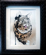 This whimsical framed watercolor of a wide-eyed tabby with its tongue out by Melanie Alves features drips and splatters in browns and blacks. Part of our original paintings collection, this unique piece adds an abstract twist, perfect for art lovers.
