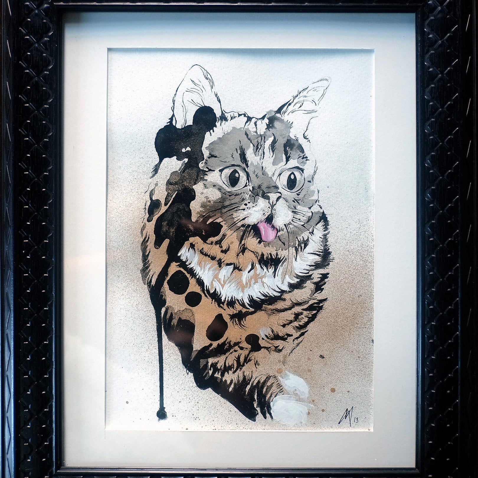 This whimsical framed watercolor of a wide-eyed tabby with its tongue out by Melanie Alves features drips and splatters in browns and blacks. Part of our original paintings collection, this unique piece adds an abstract twist, perfect for art lovers.