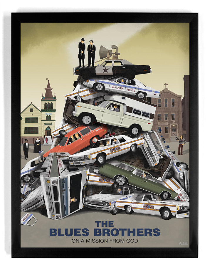 A Max Dalton giclee print depicts a dramatic stack of cars, including police vehicles and a van, with two figures in dark suits posing triumphantly on top. Buildings serve as the backdrop, featuring the caption: No Maam Were Musicians: The Blues Brothers.