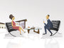 Max Daltons illustration depicts a woman in a red dress and a man in a suit seated in custom-made modern black chairs, with a glass coffee table between them. They appear at an intimate cocktail party, both holding drinks against the backdrop of a minimalist, blurred room.