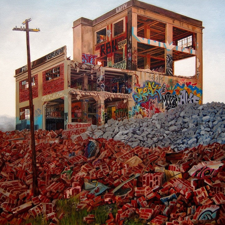 A dilapidated, graffiti-covered building with broken windows stands amidst scattered bricks, awaiting Demolition Day. A utility pole and greenery peeking through the debris create a scene reminiscent of a Jessica Hess oil on canvas.