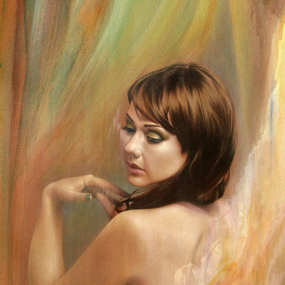 Nathan DeYoungs Sheltered Layers collection features a surreal acrylic painting of a brown-haired woman, her back partly turned as she looks downward. Abstract patterns swirl around her, and her hand gently touches her shoulder against a backdrop of warmly blended colors.