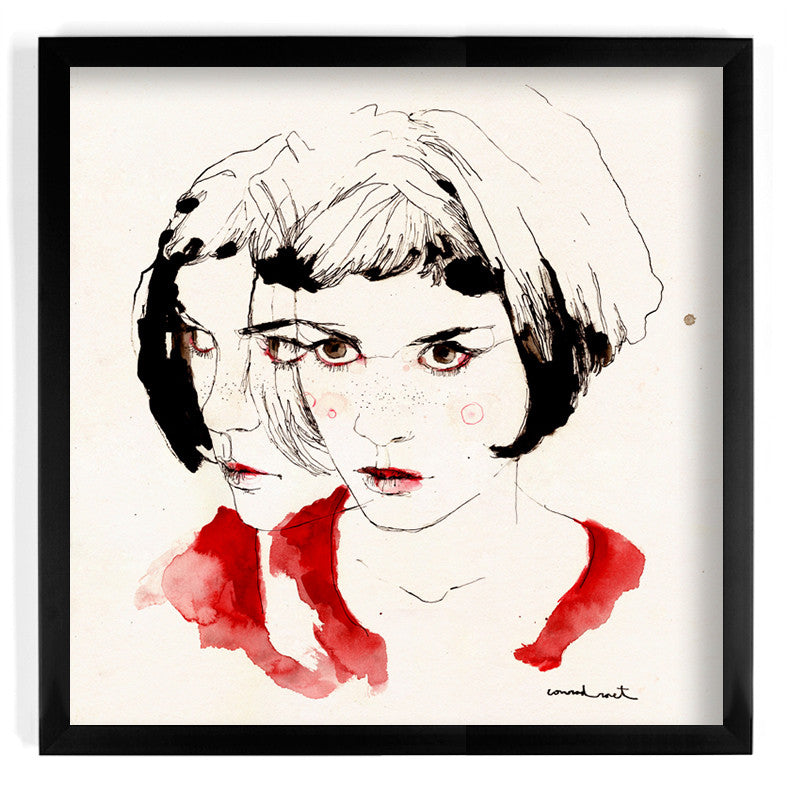 An artistic illustration by Conrad Roset depicts a woman with short hair twice, with one detailed and one sketched version. Both have red accents on cheeks and clothing, set against a white background in a custom frame for an Amélie-like charm.