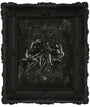 An antique frame houses a detailed artwork with two seated figures entwined in mechanical elements and gears against a textured backdrop, showcasing Handiedans mixed media fantasy and steampunk style.