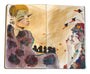 In a Moleskine sketchbook, an artistic watercolor features two abstract female figures. One has exaggerated eyelashes and a floral dress, while the other is surrounded by cranes, gazing contemplatively. Earthy tones with splashes of red and blue dominate the scene in Jen Porrecas style.