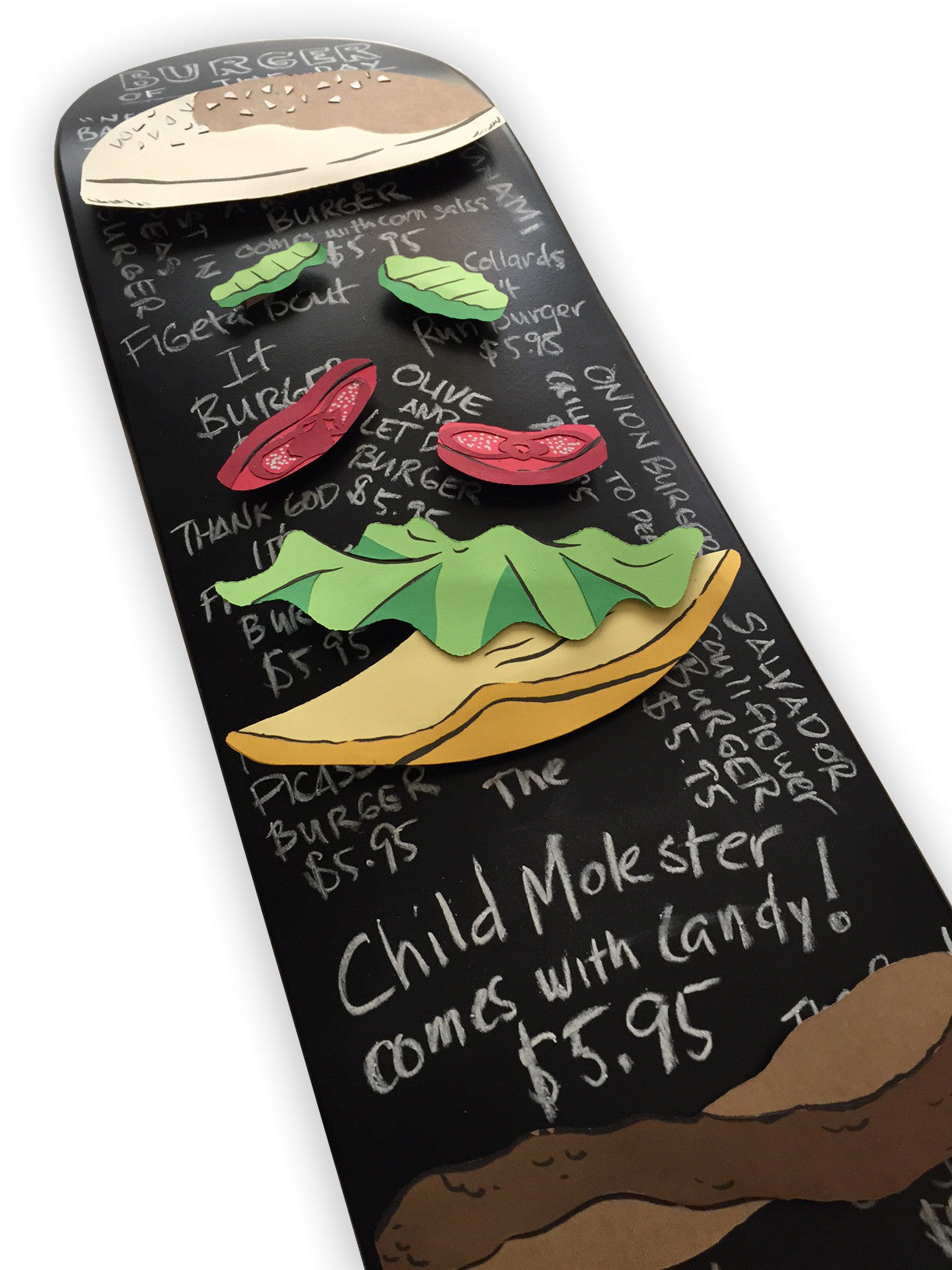 A mixed media skateboard evoking a blackboard with paper-crafted burger toppings was featured at Bobs Burgers art show. Created by Jill Bencsits & Dominic Nico Guidote, it intrigues with prices, and a controversial title: Child Molester comes with candy! $5.95, showcased at Spoke Art NYC.