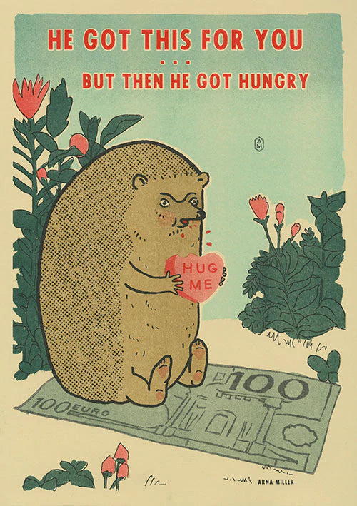 hedgehog eating a candy heart that reads "Hug Me" while sitting on floor mat with flowers around , text reads "He got this for you but then got hungry"