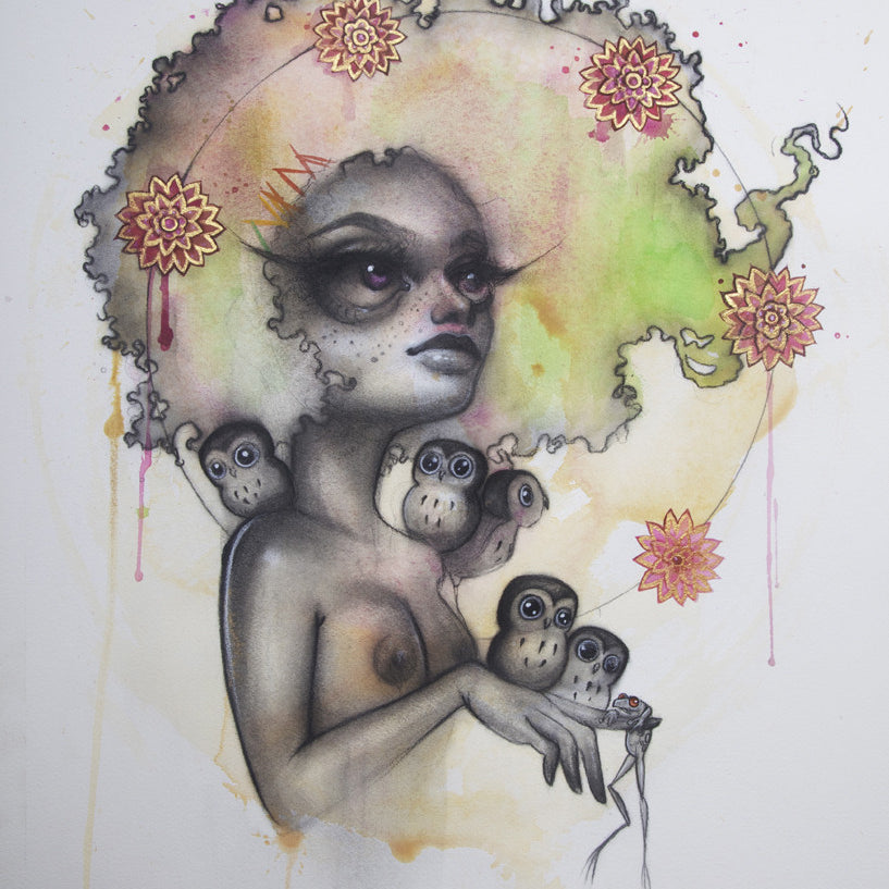 Tatiana Suarezs surreal artwork features a woman with an afro like a tree, adorned with flowers. Stylized ocelots rest on her shoulders and arms, and watercolor owls perch nearby against an earthy-toned background.
