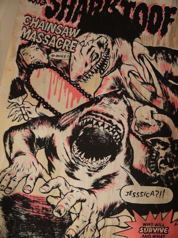 A comic-style image from Shark Toof Chainsaw Massacre shows a shark wielding a chainsaw confronting a scared person with dramatic text like JESSICA?! and WHO WILL SURVIVE AND WHAT. This striking print is in black, pink, and white.