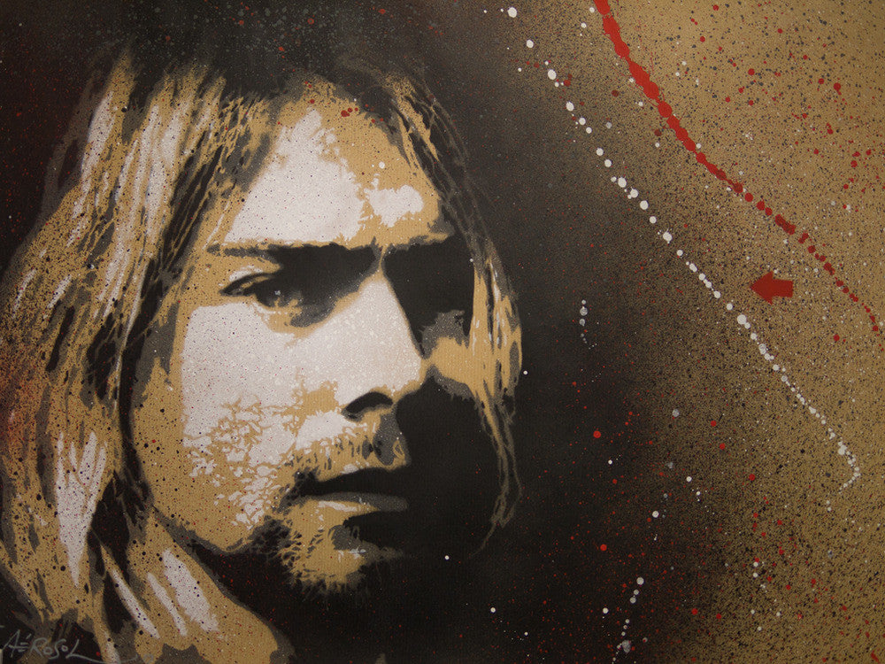A stencil-style portrait reminiscent of Kurt Cobain with long hair and a serious expression, featuring a dramatic textured background splattered in red and white paint, showcasing Jef Aérosols signature monochromatic brilliance.