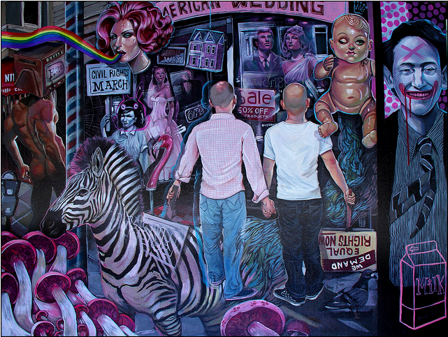 Two men stand hand in hand among symbols of American culture and societal issues, featuring a zebra, mushrooms, a rainbow, a clown, civil rights signs, and sale ads. This vibrant acrylic on canvas by Serge Gay Jr., titled Pink Party, showcases surreal chaos.