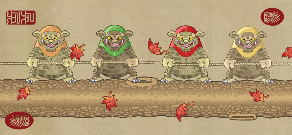 Illustration of four cartoonish, troll-like creatures wearing colorful helmets (orange, green, red, yellow) pulling a rope on a pebble-strewn path with autumn leaves falling around them. Red symbols decorate the corners in a whimsical style reminiscent of Steve Bialiks lithographs. Brand: Ninja Star Wars.
