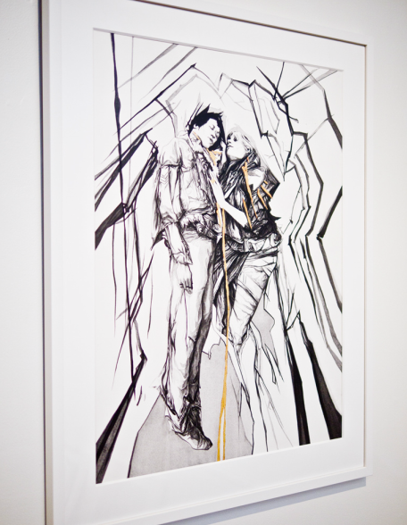 The Nimit Malavia artwork, Dangerous Lovers, shows two figures amidst abstract black lines. One figure holds a golden rod, and the sketch-like mixed media piece incorporates shades of black, white, and gray.