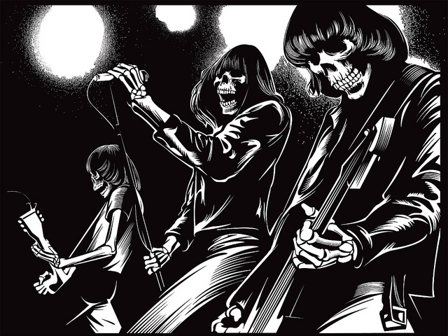 Retro Outlaw Studios presents a black-and-white screen print of three skeletal figures in a rock band, holding guitars and a microphone against bright backlighting, capturing a dramatic and eerie vibe.