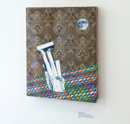 This playful piece, reminiscent of David Cooleys art, showcases a person standing on their head on a vibrant woven surface, set against intricate brown wallpaper. The small moon in the corner enhances the cosmic humor.