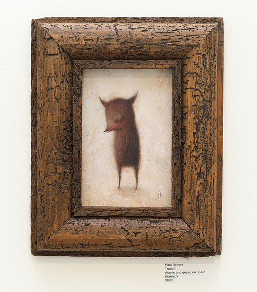 A framed acrylic painting by Paul Barnes features a surreal horned creature with a long body and short limbs against a light background. The rustic wooden frame enhances the artworks youthful energy. Text below reads: Paul Barnes, Acrylic and gesso on board, Mischief.