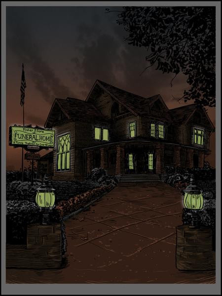 Tim Doyles screen print depicts a spooky, dimly lit funeral home at dusk with glowing windows, an eerie ambiance, and a Funeral Home sign. A lantern-flanked pathway lined with bushes leads to the building, while an American flag flutters nearby.